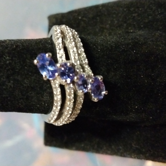 Stamped .925 Tanzanite and Diamond Ring. 4.1 Grams